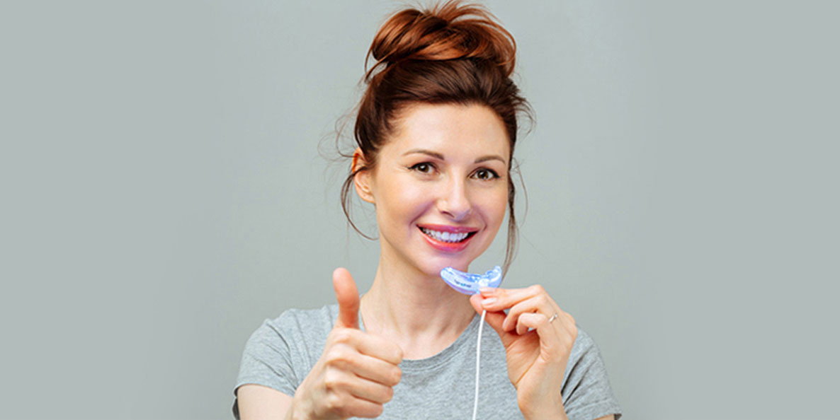 Girl with a long lasting teeth whitening